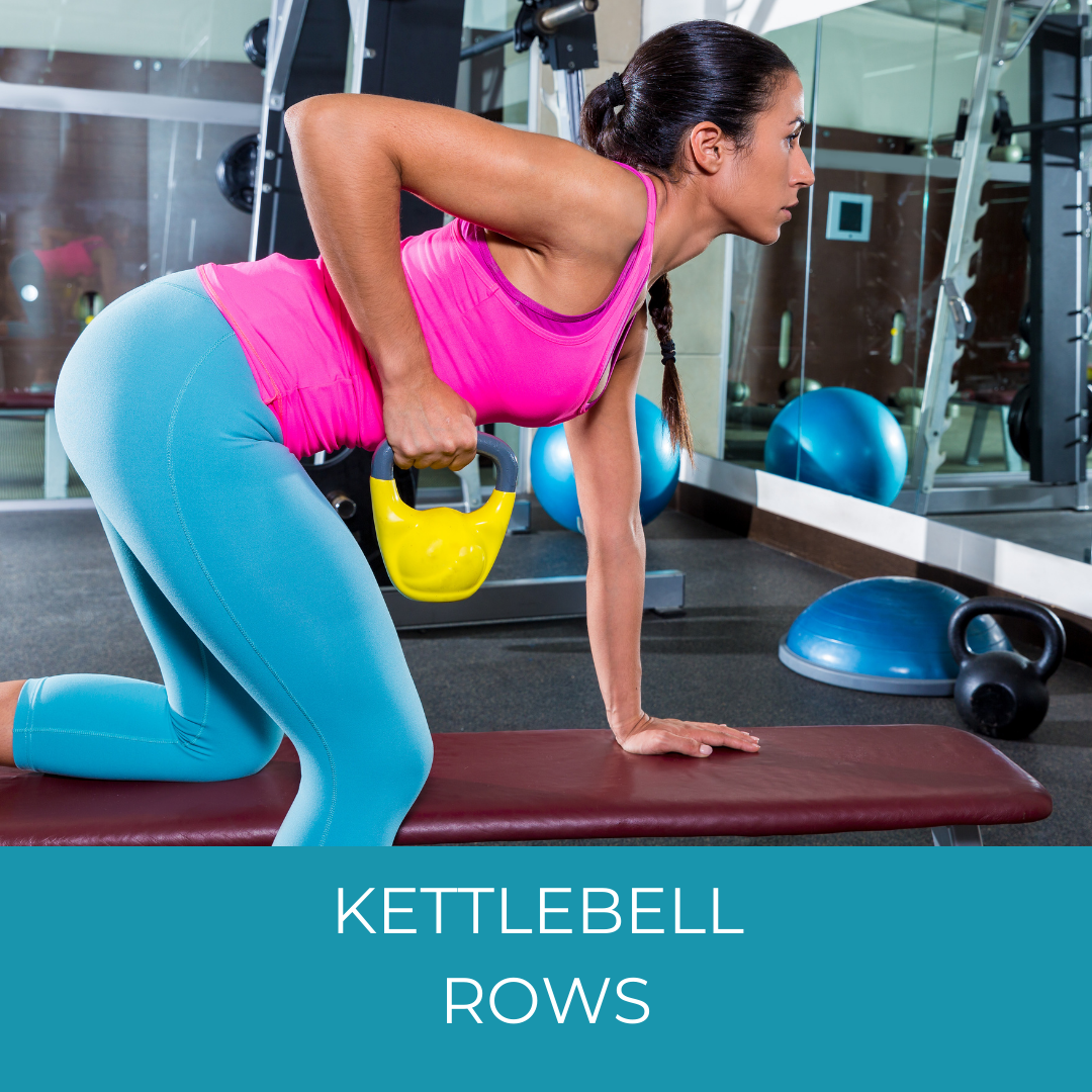 woman doing kettlebell rows on a bench in a gym