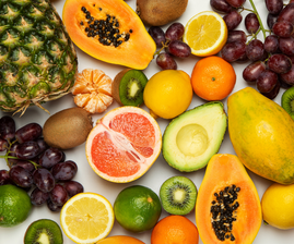 Tropical fruits spread out on a table.