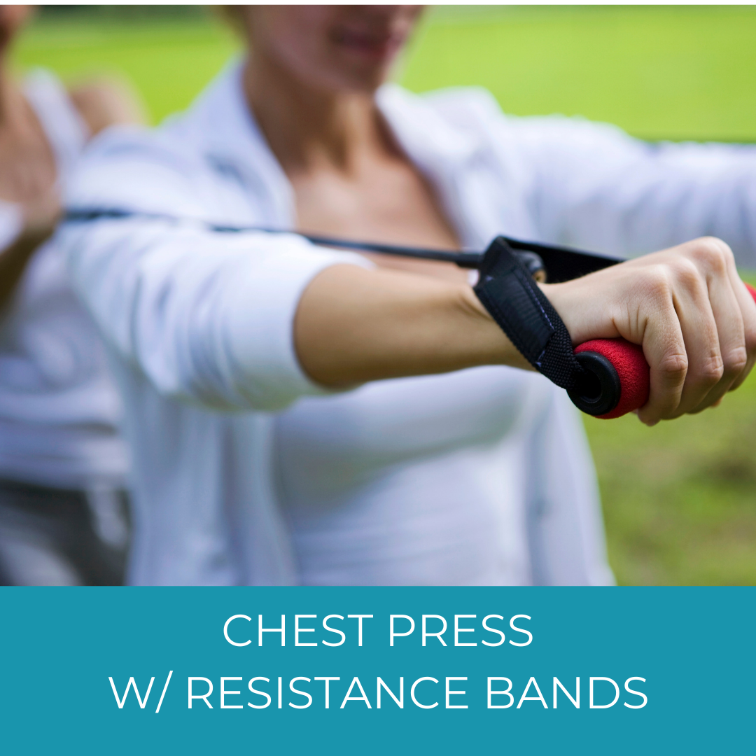 woman doing resistance band chest presses at the park