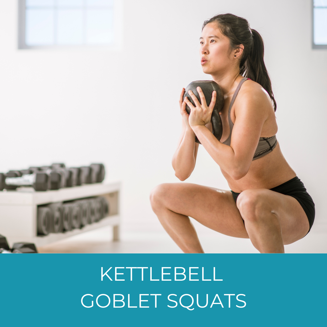 woman doing squats with an upside-down kettlebell in a gym